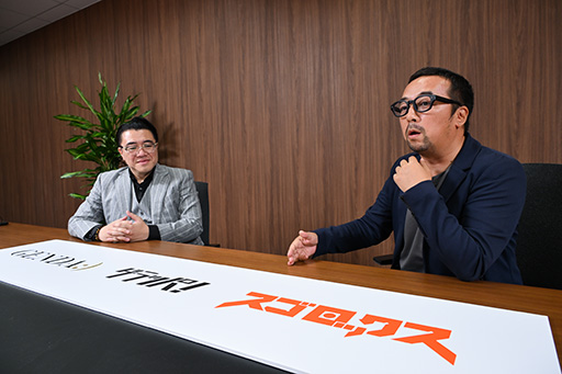 ���������꡼ No.028�Υ���ͥ������ / �Υ��󥿥ӥ塼�ϡ�����������沈�����GENDA���������å����ס�GENDA��������Υ��󥿥��Ȥˤʤ�Ȥ��ˡ�1�Ĥ��礭�����Ȥʤ�����沈����ɤ��ܻؤ��Ƥ���